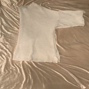 A white Indian type sweater